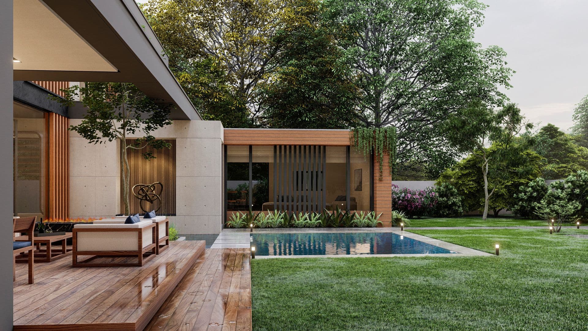 Modern home exterior with a swimming pool and outdoor seating area surrounded by lush greenery.