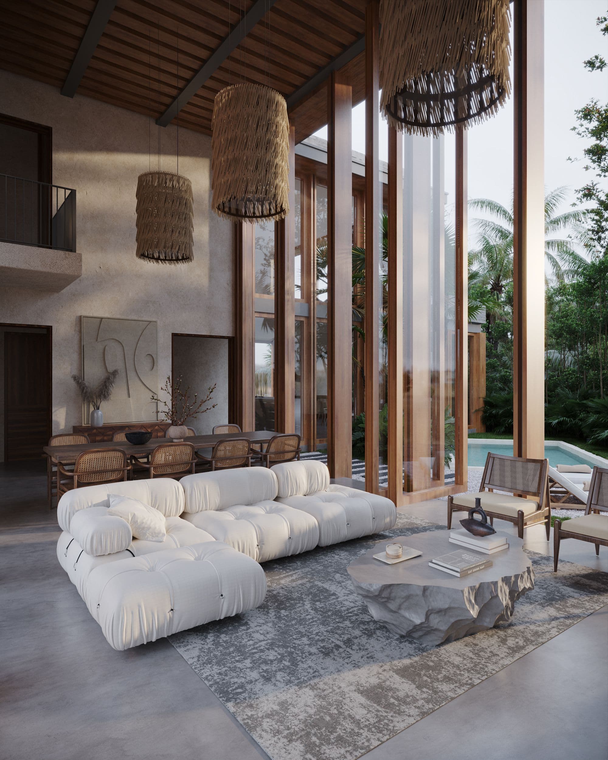 Spacious modern living room with large sectional sofa and stone coffee table.