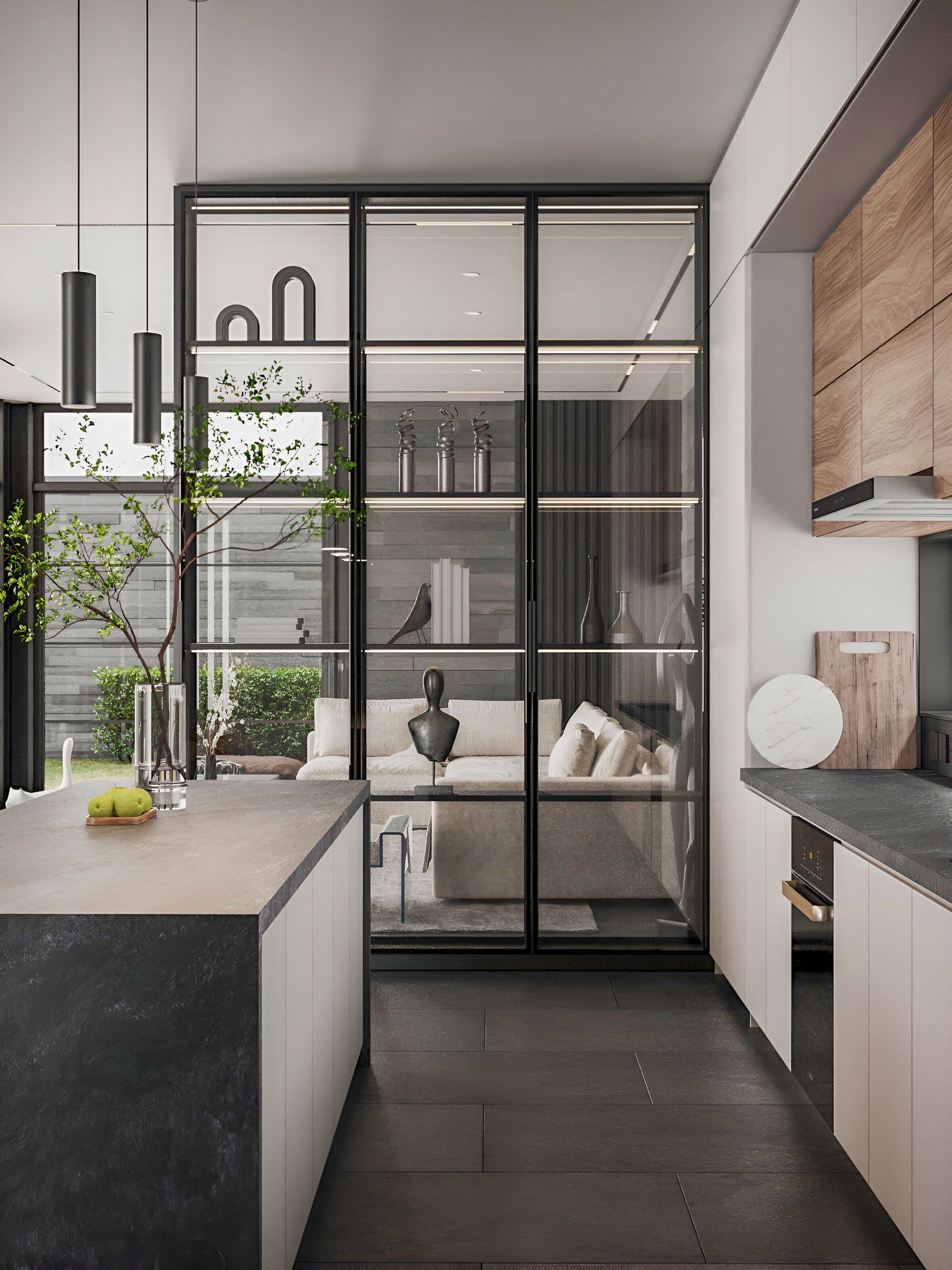 Modern kitchen island with gray countertop and dark cabinets, adjacent to a glass-enclosed display cabinet with shelves.