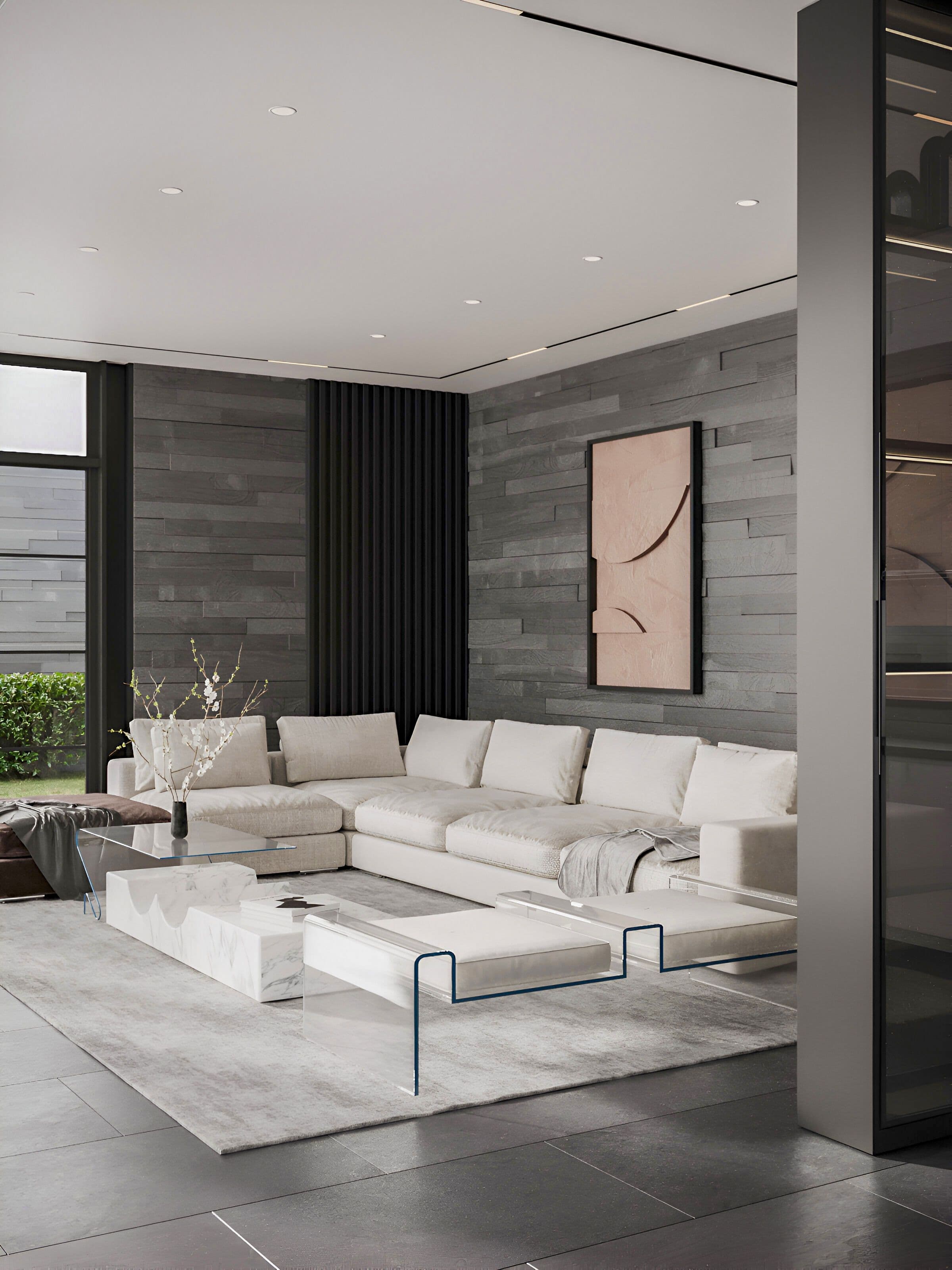 Spacious modern living room with a large sectional sofa and abstract art.