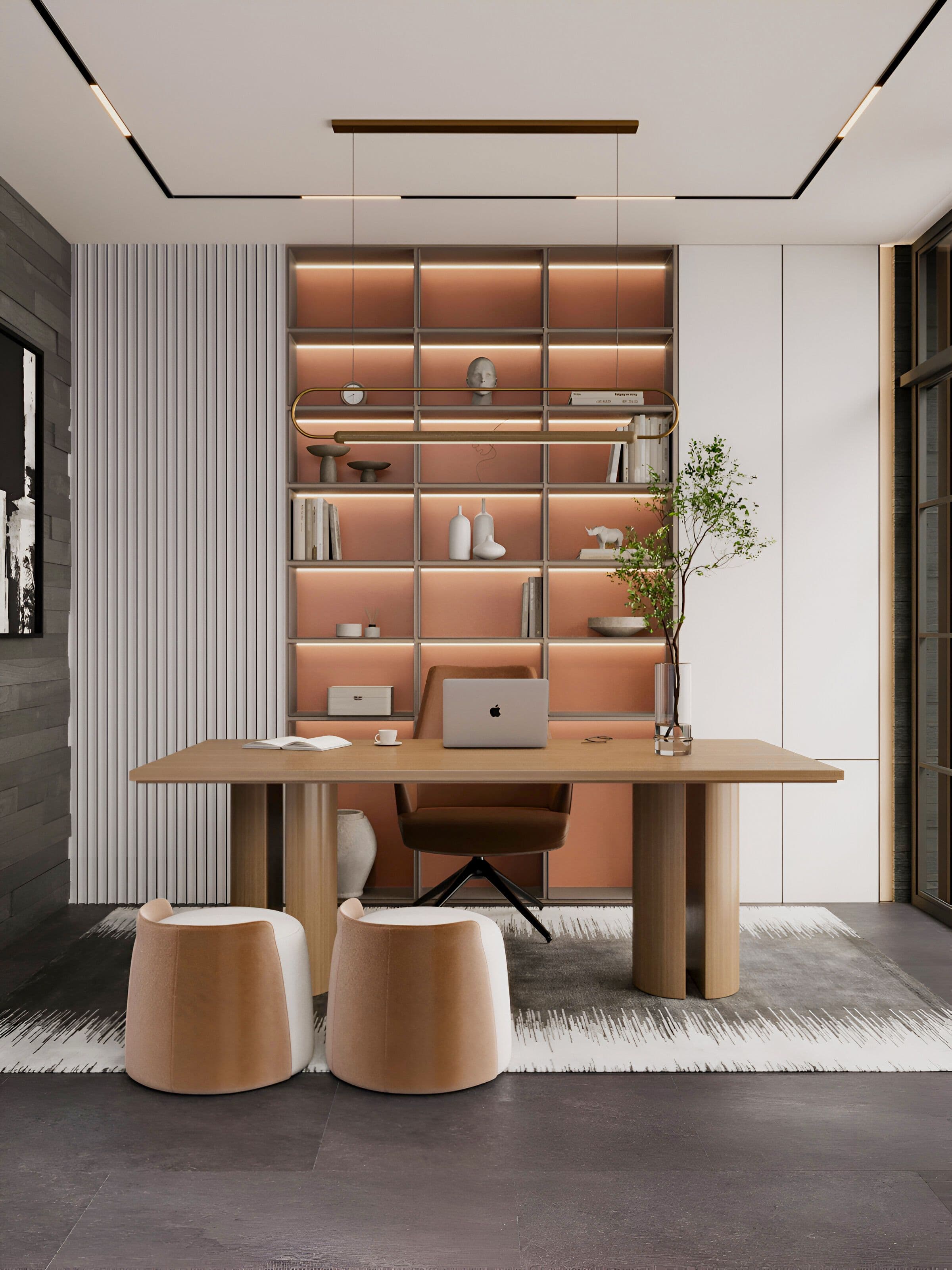 Modern home office with a wooden desk, laptop, and illuminated bookshelves.